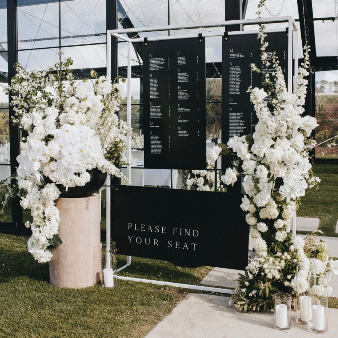 Luxe black seating chart with white writing by Class Ink Designs. 